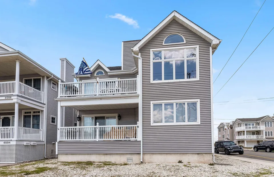 We see the front of a grey house in Ocean City, NJ.